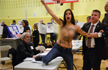 Naked protestors crash Trump polling station